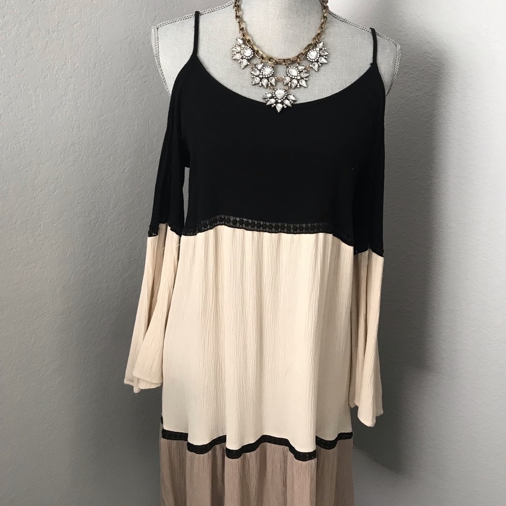 Black, cream, tan cold shoulder dress.